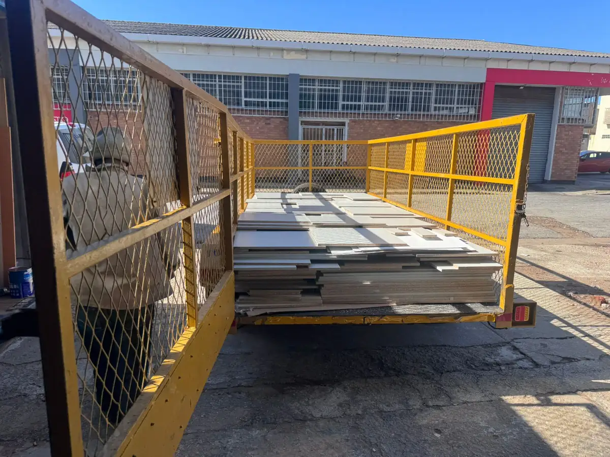 A trailer loaded with cut and edged panels, ready to leave the yard.